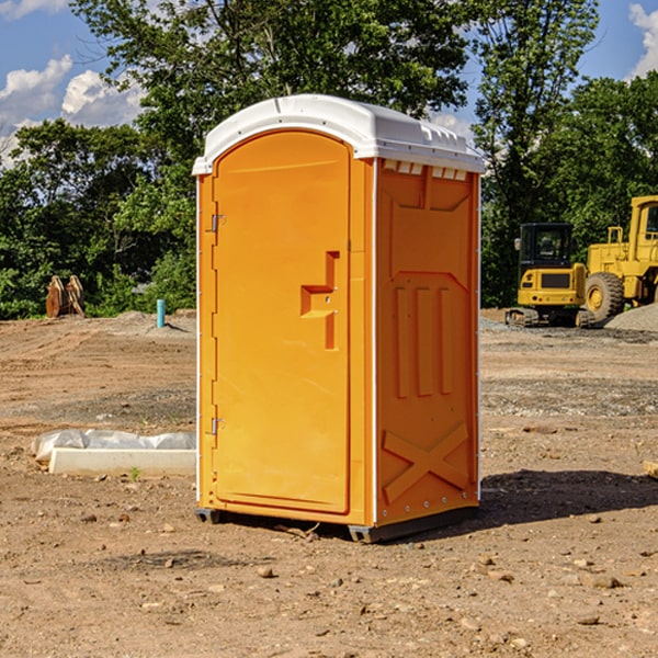 how often are the portable toilets cleaned and serviced during a rental period in Alpine MI